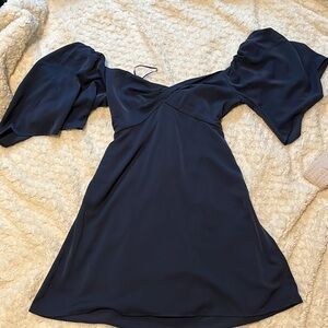 Abercrombie short navy dress with bat wings and built in shorts.